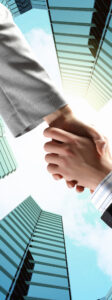 close-up-image-of-hand-shake-against-skyscrapers-2026-04-14-00-13-36-utc